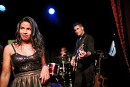 Sally A. Mercedes prepares to sing at the Triad Theater in Manhattan. Ms. Mercedes is also a writer/life coach.