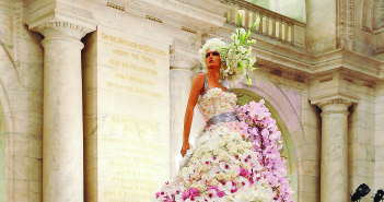 A faux-bride wearing a dress made of flowers and two floral poodles, designed by event planner Preston Bailey. Photograph: Supplied by PRESTON BAILEY