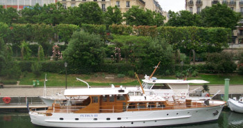 The Petrus III, a small yacht in Paris owned by Patrick Esquerre, founder of La Madeleine. Petrus III is docked in the Seine's Bassin de l'Arsenal, right by the Bastille monument, and available for rent. Photograph by Joyce Harris/special to "FD Luxe" magazine.
