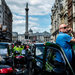 Cabbies in London and other cities demonstrated against the taxi-service app Uber. Page B3.