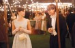 Felicity Jones and Eddie Redmayne woo each other under the lights of Cambridge in The Theory of Everything.