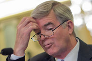 Mark Emmert, the N.C.A.A.'s president, testifying before a Senate committee this month. Emmert generally defended the organization's current model but acknowledged several of the senators' concerns.
