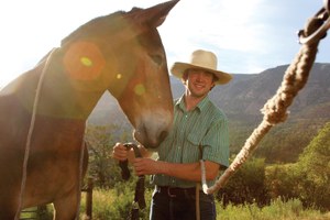 A young mule stringer helps keep a dying profession alive