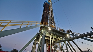 An oil & gas drilling rig is drilling a well for Pioneer Natural Resources in the Eagle Ford Shale formation near Yorktown.