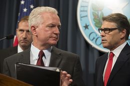 Texas Sen. Charles Schwertner, Dr. Brett Giroir and Gov. Rick Perry at an Ebola press conference at the Texas Capitol on Oct. 6, 2014.