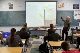 Hank Warner teaches a pre-advanced placement algebra course for ninth-graders at Bowie High School in Austin.