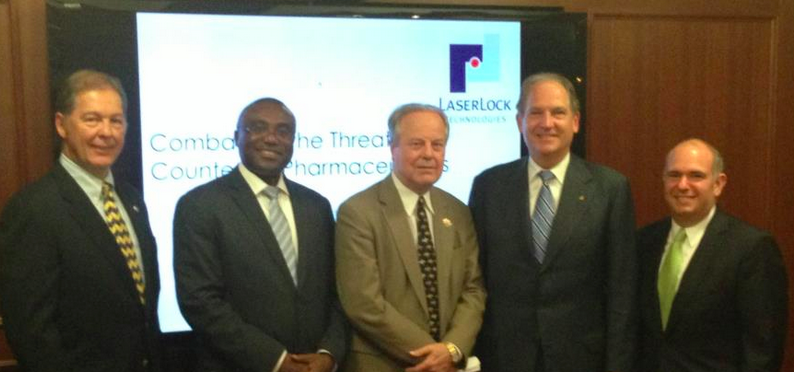 Rep. Ed Whitfield, middle, poses with LaserLock executives at an event hosted by Georgetown University