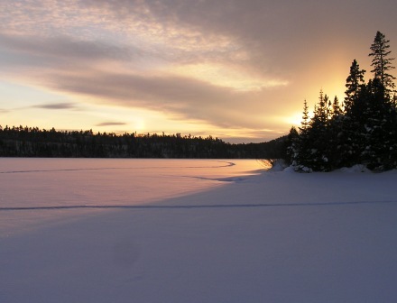 Sunrise over a winter lake