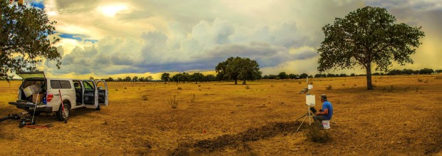 Todd Caldwell works on a soil moisture monitoring station in Central Texas. 