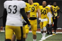  Ryan Shazier, #50, stretches with his teammates as the Steelers practice in preparation for their Sunday game against the New Orleans Saints from their South Side training facility on Wednesday, Nov. 26, 2014.  