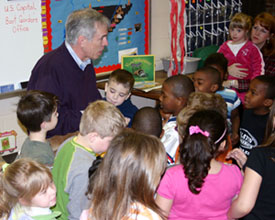 Bart reads to students at Howard Elementary School in Gallatin.