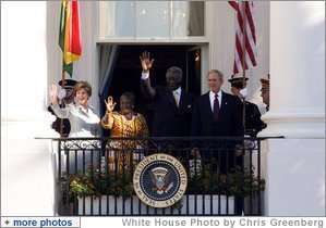 President George W. Bush and Mrs. Laura Bush, joined by President John Agyekum Kufuor and Mrs. Theresa Kufuor of Ghana, acknowledge the crowd Monday, Sept. 15, 2008, following the South Lawn Arrival Ceremony for President Kufuor and Mrs. Kufuor of Ghana at the White House. White House photo by Chris Greenberg
