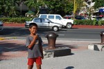 MANILA BAY - FILIPINO - CHILD - POVERTY - VEHICLES - TREES - ENVIRONMENT - CLIMATE CHANGE - PHILIPPINES