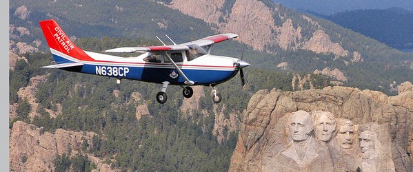 South Dakota Wing Cessna 182 over Mount Rushmore