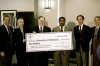 EPA's Russell Wright (thrid from right) presenting check.