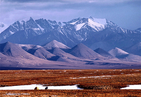 Spring camping in the Arctic Refuge.
The 1002 Area of the coastal plain
is in the foreground, with the Brooks Range
mountains in the background. -USFWS