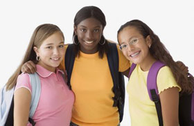 three girls with backpacks