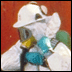 Small image of a chemical responder in protective gear.