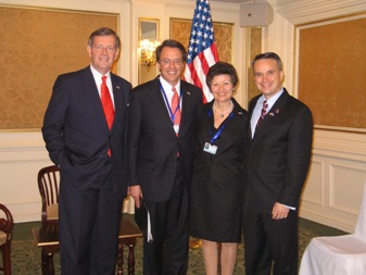 January 14, 2008 – Members of the Presidential Delegation to the Inauguration of the Honorable Álvaro Colóm as President of Guatemala. From left to right: U.S. Secretary of Health and Human Services Michael O Leavitt; the Honorable Rob Mosbacher, President of the Overseas Private Investment Corporation; the Honorable Sara Martínez Tucker, Under Secretary of Education; and the Honorable Christopher A. Padilla, Under Secretary of Commerce for International Trade.