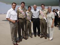 President George W. Bush presented the President's Volunteer Service Award to Mark Hendricks, 20, Jake Wellman, 18, and Alex Braden, 20, upon arrival in Redding, California, on Thursday, July 17, 2008.  California Governor Arnold Schwarzenegger also joined the President in presenting the award.  The students are Eagle Scouts and members of the Order of the Arrow, the national honor society of the Boy Scouts of America. To thank them for making a difference in the lives of others, President Bush honors volunteers when he travels throughout the United States.  This award presentation includes the 650th volunteer the President has honored since March 2002. 