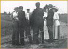 Wilbur, Orville, Katharine, Wright and others at Fort Meyer, Virginia, at site of Wright Signal Corps Machine flight, July 1909. 