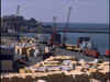 photo of cargo being loaded at a port - link to Ports and Domestic Shipping section of the Maritime Administration Library