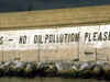 photo of coastal break with words “No Oil Pollution Please” - link to Environment section of the Maritime Administration Library