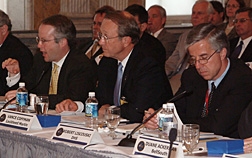 As Dr. Vance Coffman (center) and Robert Liscouski (right) listen, Paul Kurtz, Senior Director for Critical Infrastructure Protection with the White House Homeland Security Council, addresses members the President’s National Security Telecommunications Advisory Committee (NSTAC)