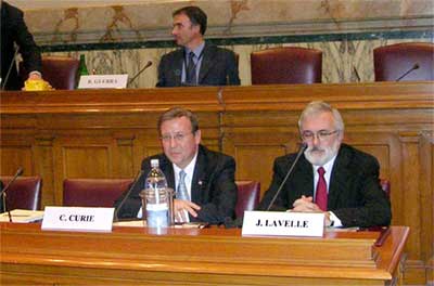 photo of Charles G. Curie and James Lavelle at the 2004 Project 1 Billion conference in Rome, Italy