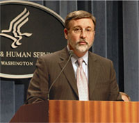 photo of Charles G. Curie, M.A., A.C.S.W., SAMHSA Administrator standing at podium