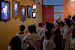 Children from Camp Invention watch the USPTO Museum's Portrait Gallery Video Exhibit at it's opening last week