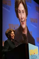 Mrs. Laura Bush speaks to the ServiceNation Summit at the Hilton New York Hotel Grand Ballroom in New York City on Sept. 12, 2008. Mrs. Bush cited President Bush's challenge to service and added that "Americans today have more opportunities to volunteer through government-supported national service programs." 