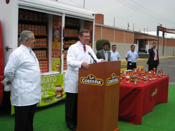 June 23, 2008 – Secretary Mike Leavitt talks to reporters at La Costeña, a food processor in Mexico. He cited the plant as an example of good practices because foods at La Costeña are inspected at every step through processing and packaging.