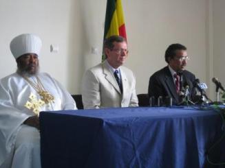 August 11, 2008 – From left to right: His Holiness Abune Paulos, Patriarch of the Ethiopian Orthodox Church; HHS Secretary Mike Leavitt; and Minister of Health Tewodros Adhanom Ghebreyesus, Ph.D. discuss the important role the faith-based community plays in delivering health care in Ethiopia at a press conference at St. Peter's Hospital. The hospital treats many with HIV/AIDS. (Photo Credit: Holly Babin, HHS)