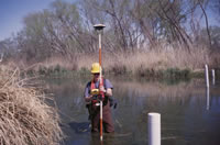 A dual-frequency GPS receiver is used to survey passive-diffusion samples ('peepers) in a wetland at the leading edge of the leachate plume