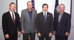 OSHA’s then-Assistant Secretary Henshaw with representatives from three different shipbuilding organizations that have signed national Alliances. From left to right: Richard McCreary, Shipbuilders Council of America; Steve Strom, National Shipbuilding Research Program and Paul Robinson, American Shipbuilding Association.