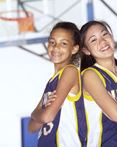 Photo of two girls who play basketball