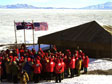 Photo of a crowd gathering at Scott's Discovery Hut near McMurdo Station.