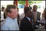 Photo thumbnail: Secretary Mike Leavitt and Haiti Minster of Health Robert Auguste answer questions at a press conference at the University Hospital de la Paix in Port-au-Prince, Haiti.