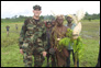 photo thumbnail: CDR John Moroney with locals from Josphstaal, a very remote area of Papua New Guinea.
 