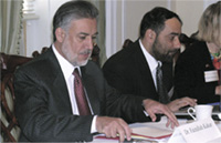 photo of Dr. Faizullah Kakar and Dr. Ruhullah Nassery preparing to address the Workgroup on Afghanistan Mental Health at the Embassy of Afghanistan in Washington, DC