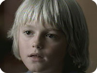 PSA showing face of young boy with message, “My name is Brandon. In 9 years, I'll be an alcoholic.” - click to view PSAs
