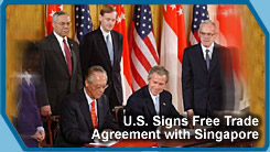 President George W. Bush and Singapore Prime Minister Chok Tong Goh sign a free trade agreement in the East Room on May 6, 2003.  (White House Photo by Tina Hager)