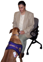 photo of Dr. Joan Esnayra introducing one of her spychiatric service dogs