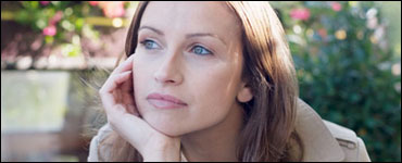 Photo: woman pondering a thought