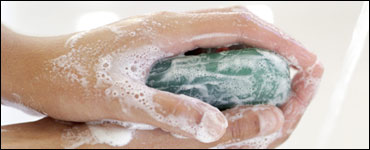 Photo: Two hands with a bar of soap