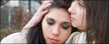 Photo: Girls consoling each other