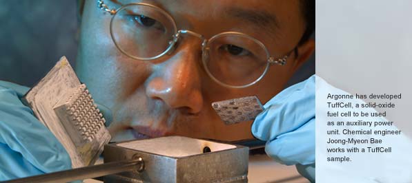 Argonne has developed TuffCell, a solid-oxide fuel cell to be used as an auxiliary power unit.  Chemical engineer Joong-Myeon Bae works with a TuffCell sample.
