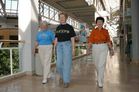 Photo of three women walking. - Click to enlarge in new window.
