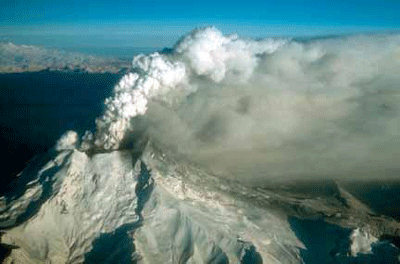 Aerial view of Redoubt Volcano, Alaska during a low-level eruption of steam and ash